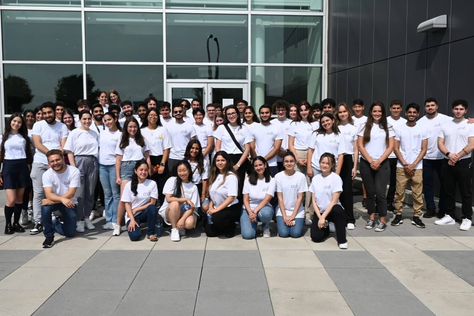 Group photo of our volunteers and members at our 2023 Christmas in July event